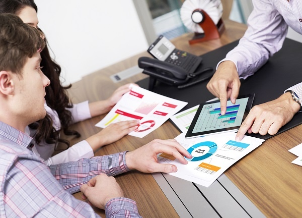 meeting-charts-numbers-metrics-sales.jpg